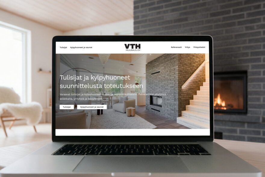 VTH-Muurauksen verkkosivut kannettavan n&auml;yt&ouml;ll&auml; takan edess&auml;
