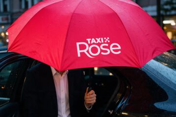 Taxi Rosen logo punaisessa sateenvarjossa